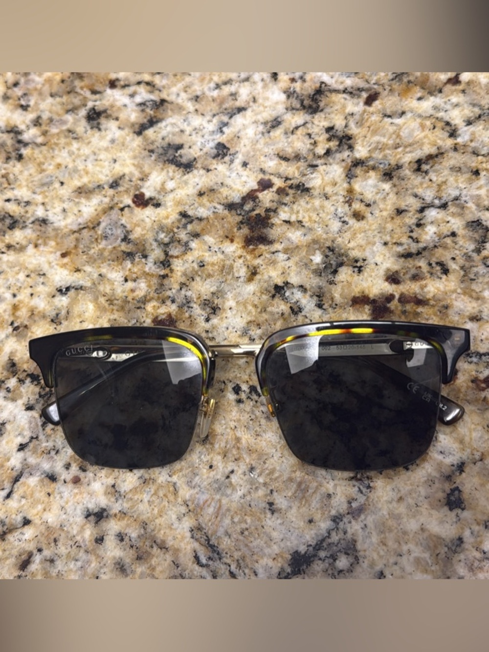 Gucci Black Lensed Half-Rim Sunglasses with Gold Accents